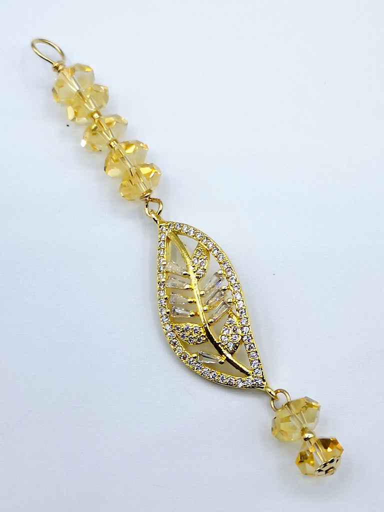 A gorgeous pendant handmade with natural faceted luminous Citrine rondels, with a stunning swirl leaf shape accent, set with Cubic Zirconia. A beautiful pendant with a touch of luxury and sophistication.