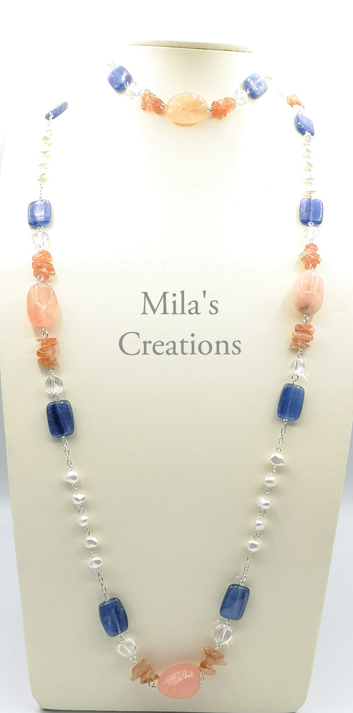 This beautiful necklace has been designed and handmade with a delicate combination of Morganite and Kyanite with little chips of Sunstone and splashes of heart shaped Quartz and baroque Freshwater Pearls. 